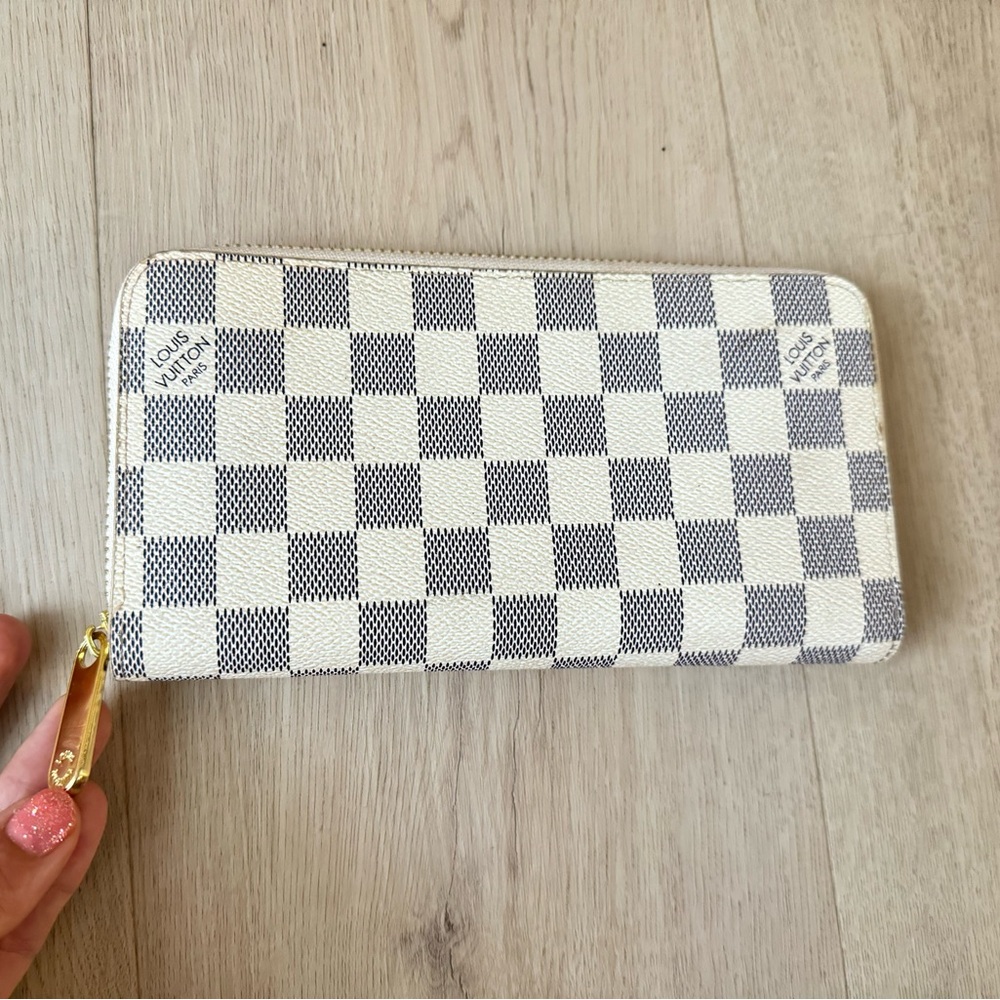 Checkered LV wallet with gold accents